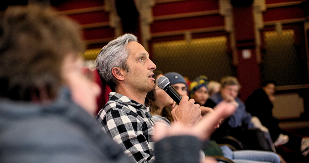 Audience member part taking in debate